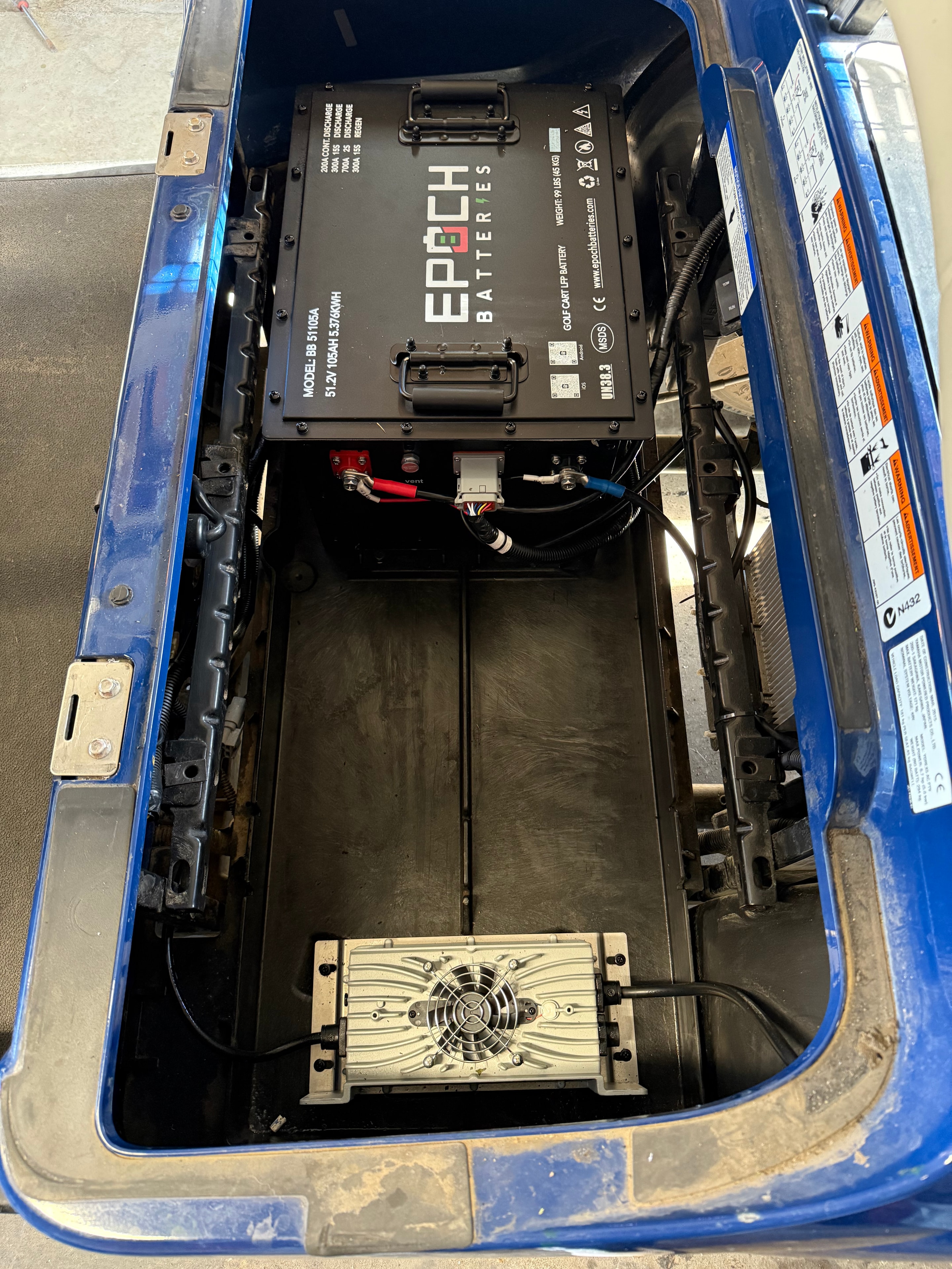 Epoch lithium battery and controller installed in a blue golf cart