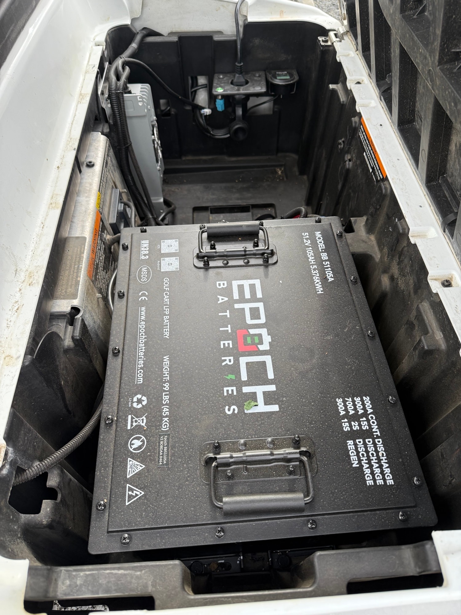 Epoch lithium battery installed in a golf cart battery compartment