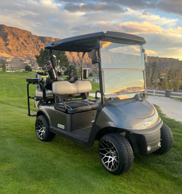 EZGO golf cart on a grassy course