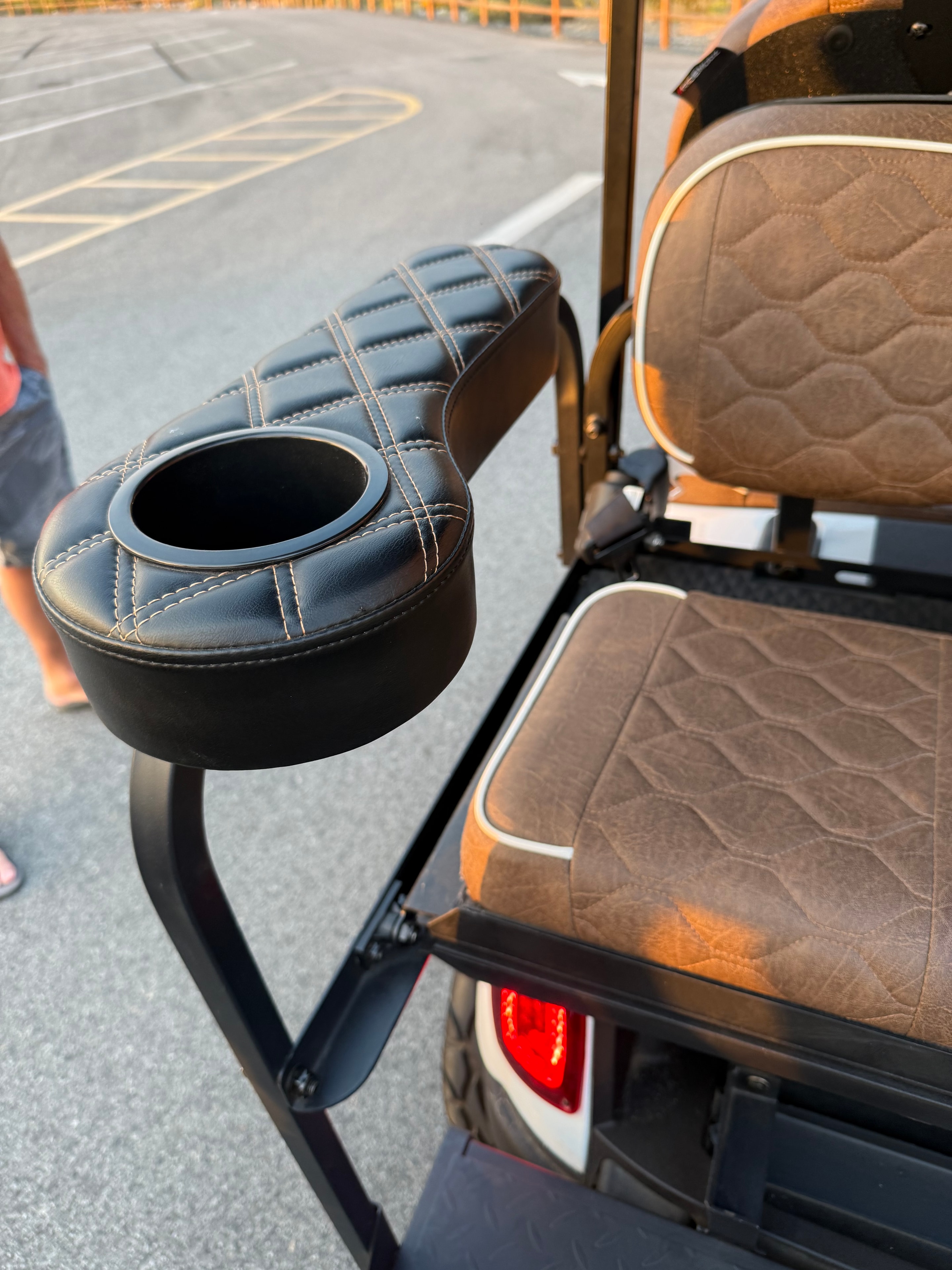 Custom golf cart seat with tan diamond stitching and speaker